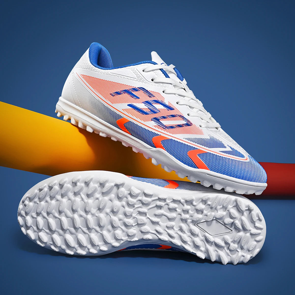 Adult TF football shoes are breathable, mesh, durable, flexible, casual, outdoor, stable, and professional football shoes.