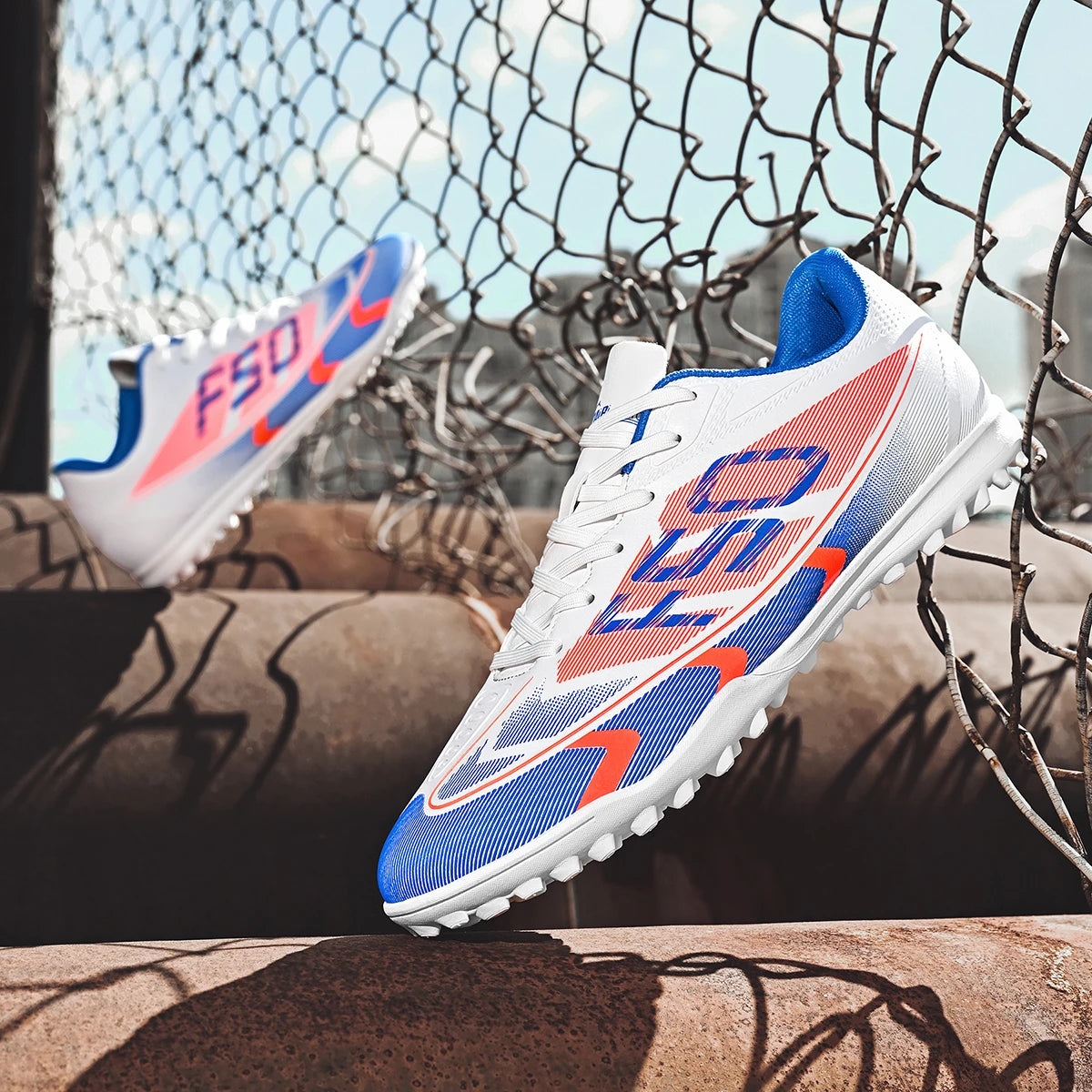 Adult TF football shoes are breathable, mesh, durable, flexible, casual, outdoor, stable, and professional football shoes.