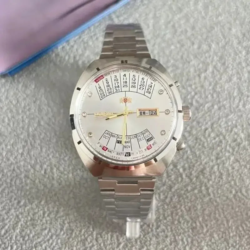 118A Store Orient automatic mechanical unisex watch with large rotating dial, fully functional stainless steel Japanese movement